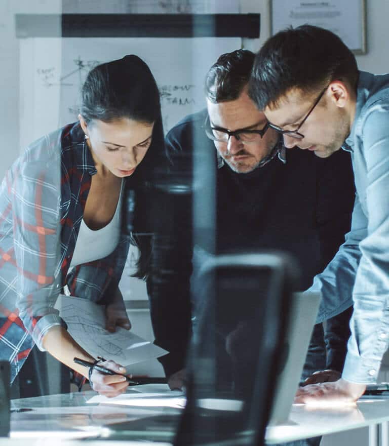 Colleagues working together in modern office